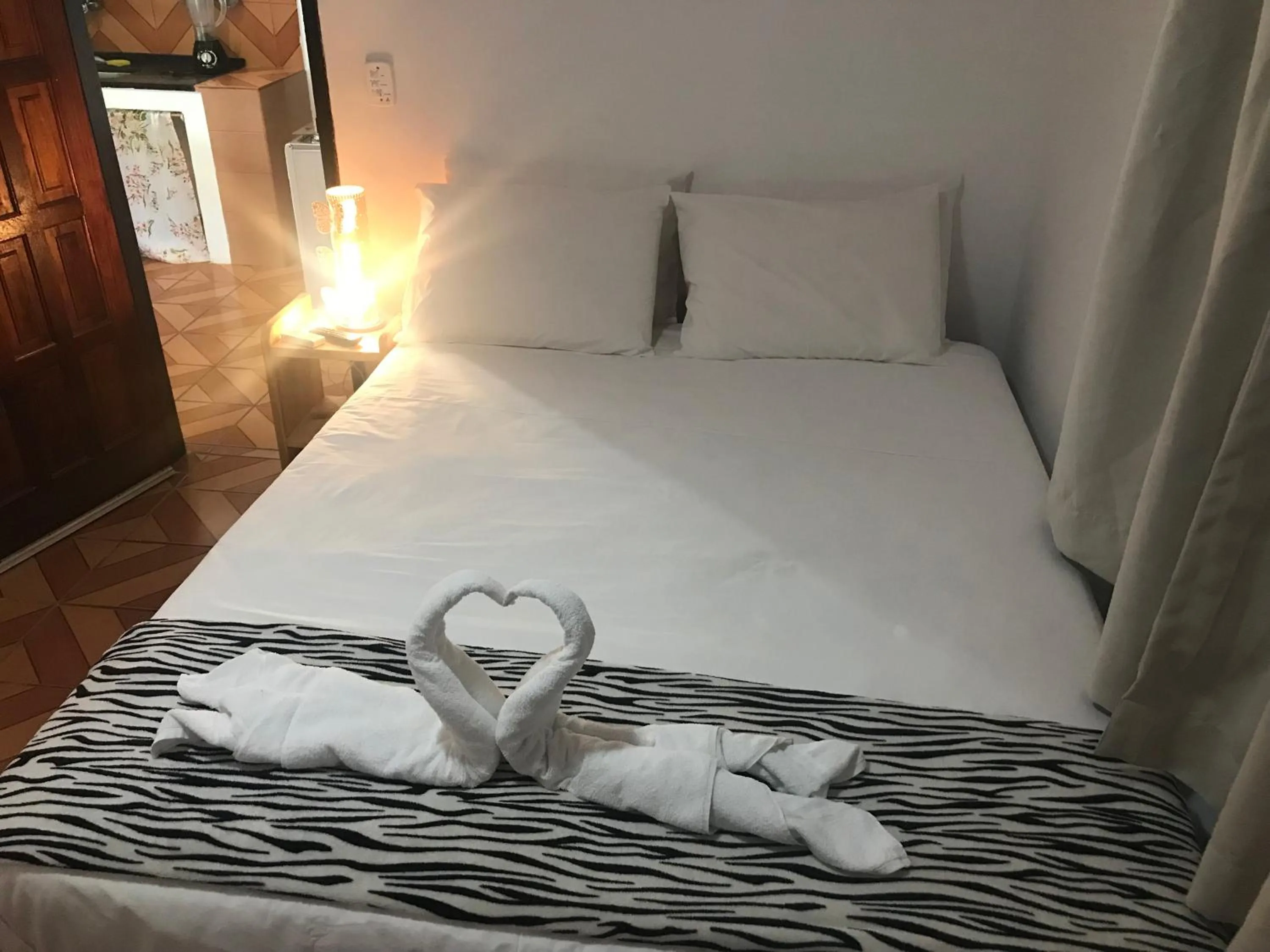 Bed in Pousada do Mineiro