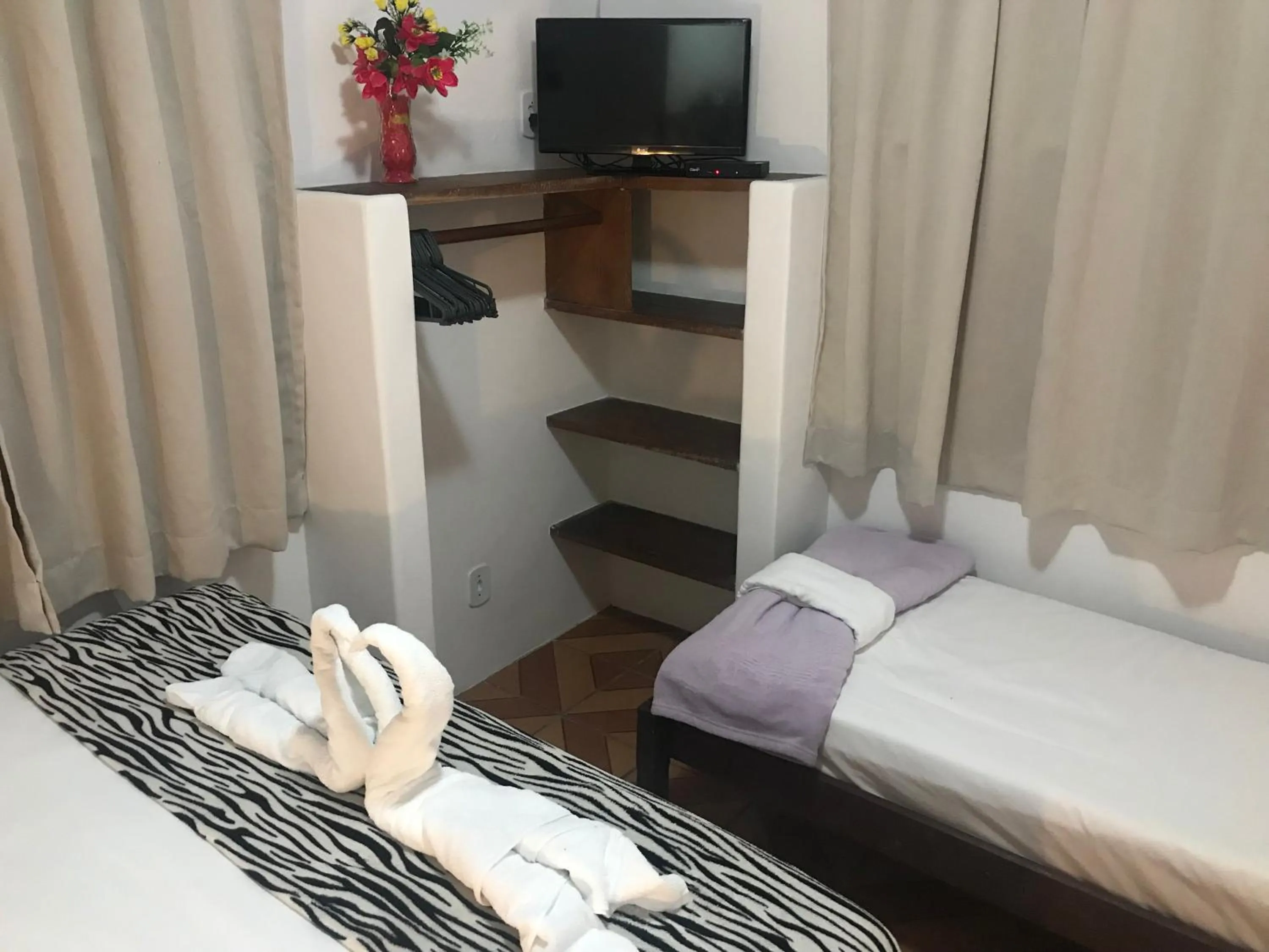 Bed in Pousada do Mineiro