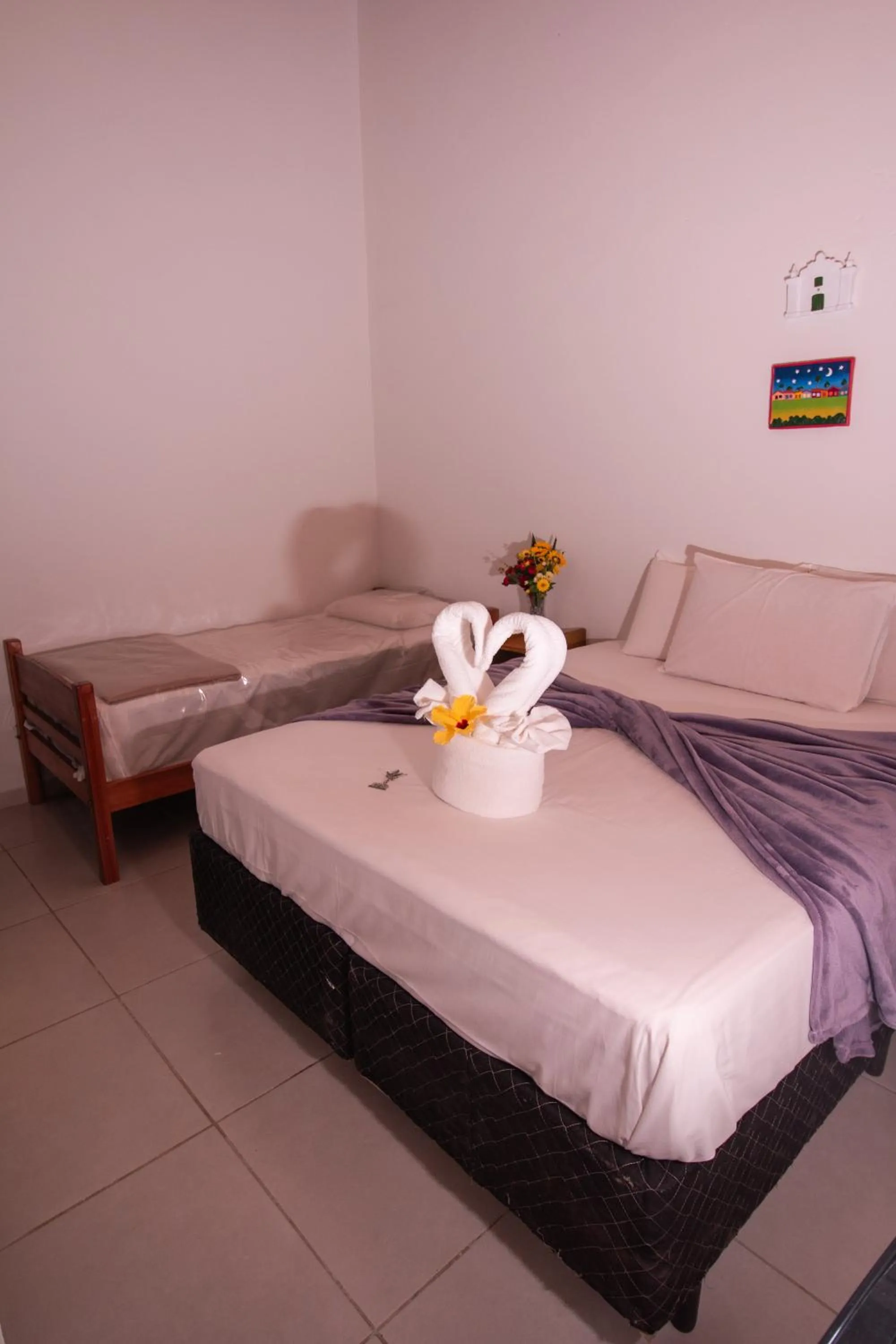 Bed in Pousada do Mineiro