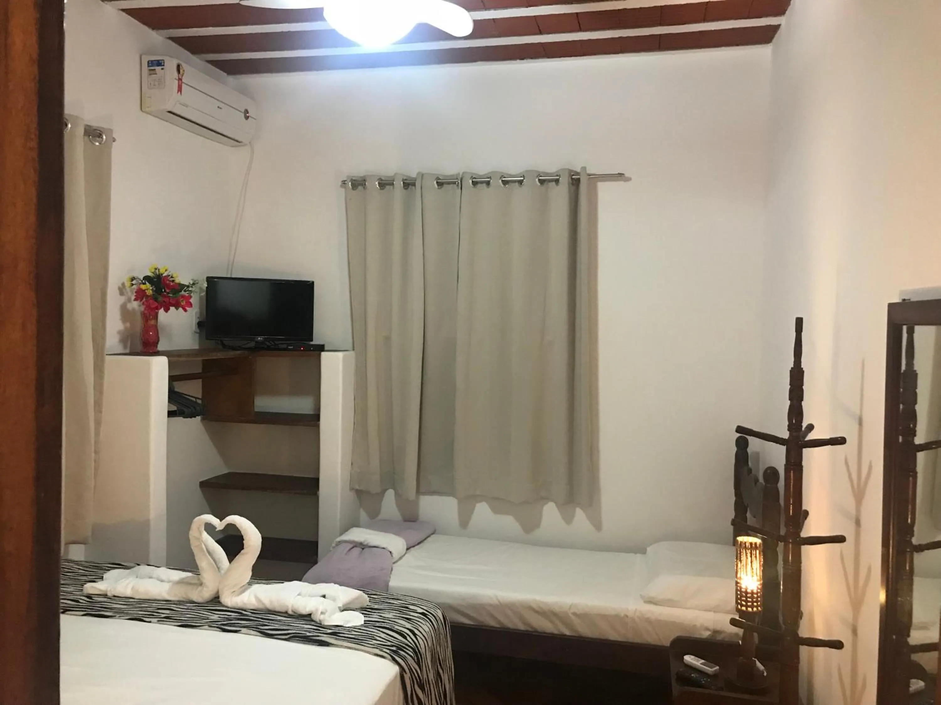 Bed in Pousada do Mineiro