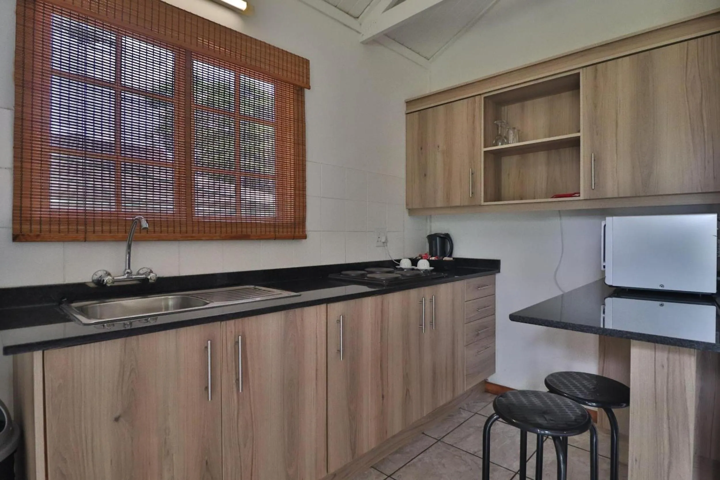Kitchen or kitchenette in Kruger View Chalets