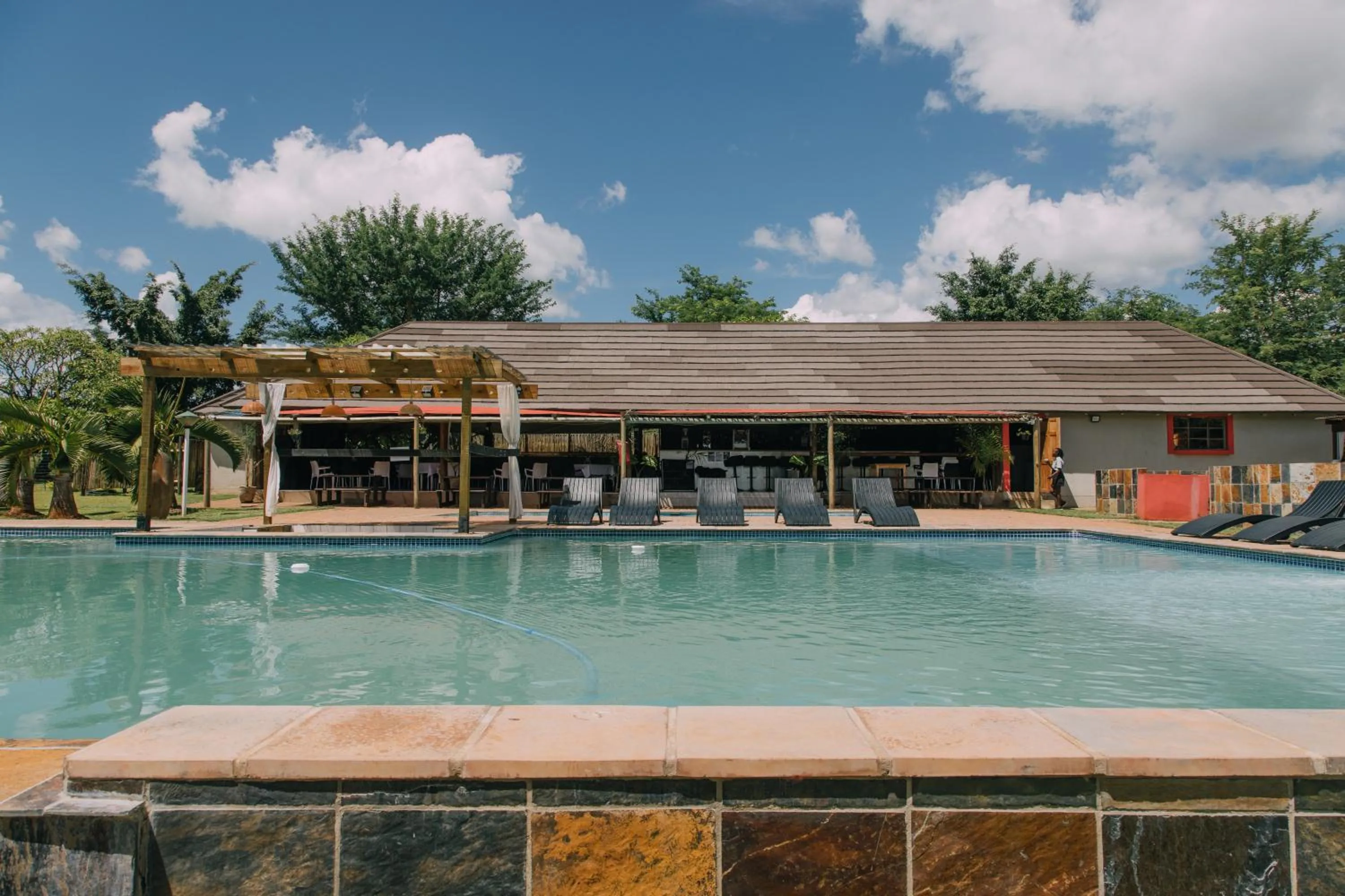 Lounge or bar in Kruger View Chalets
