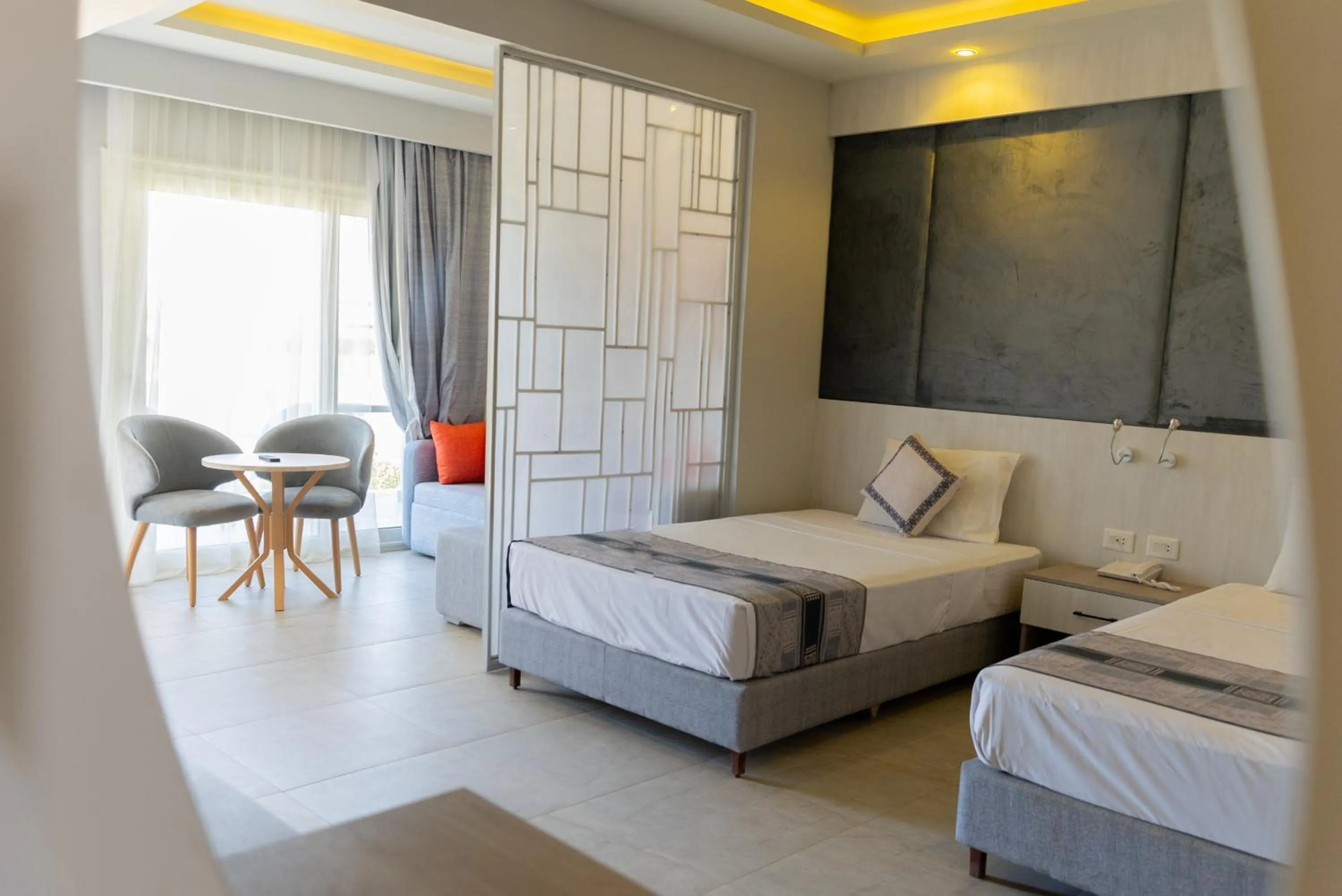 Photo of the whole room, Bed in Aladdin Beach Resort