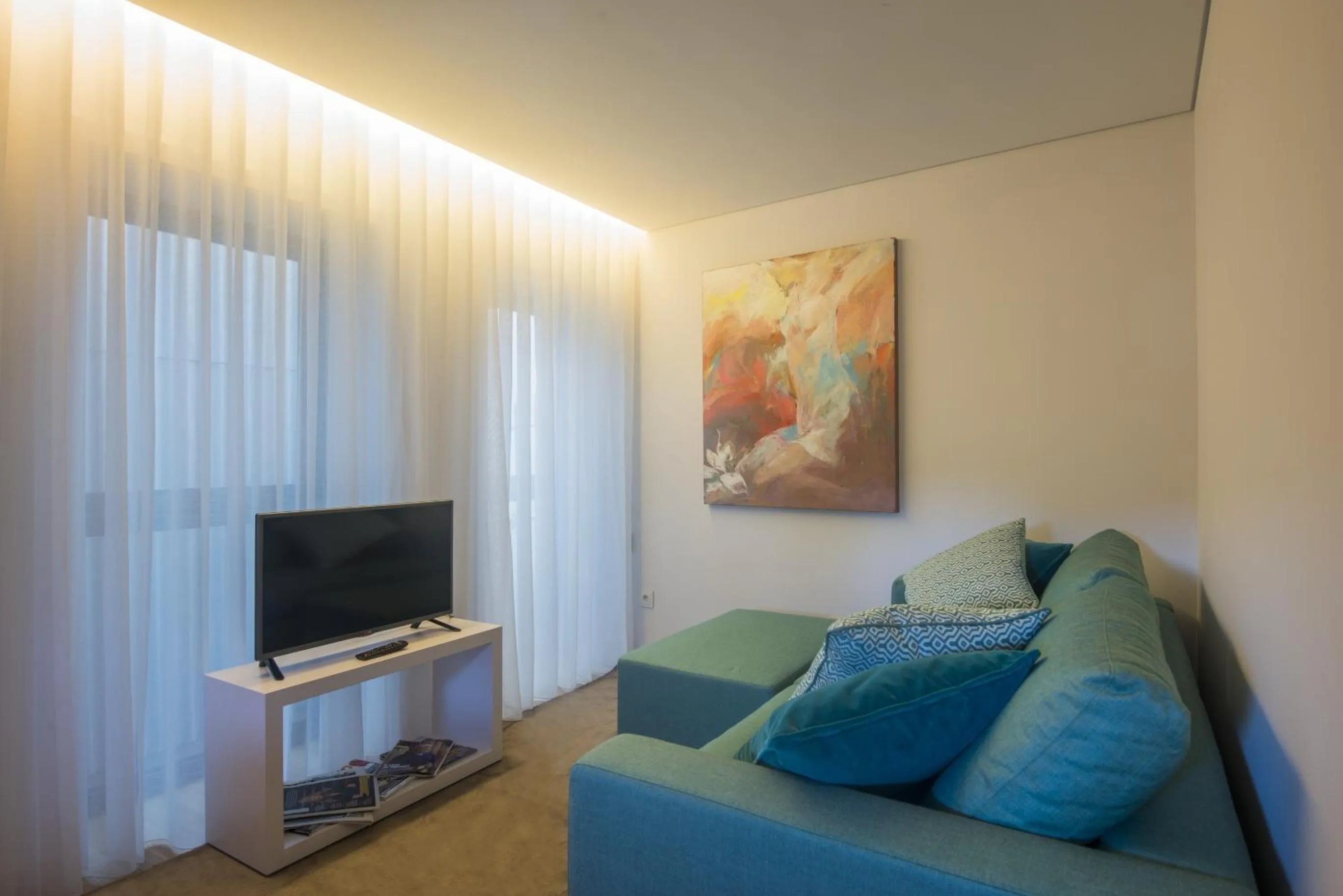 Communal lounge/ TV room in Domum