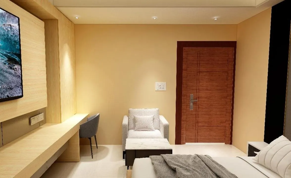 Seating area, Bed in Hotel Golden Continental