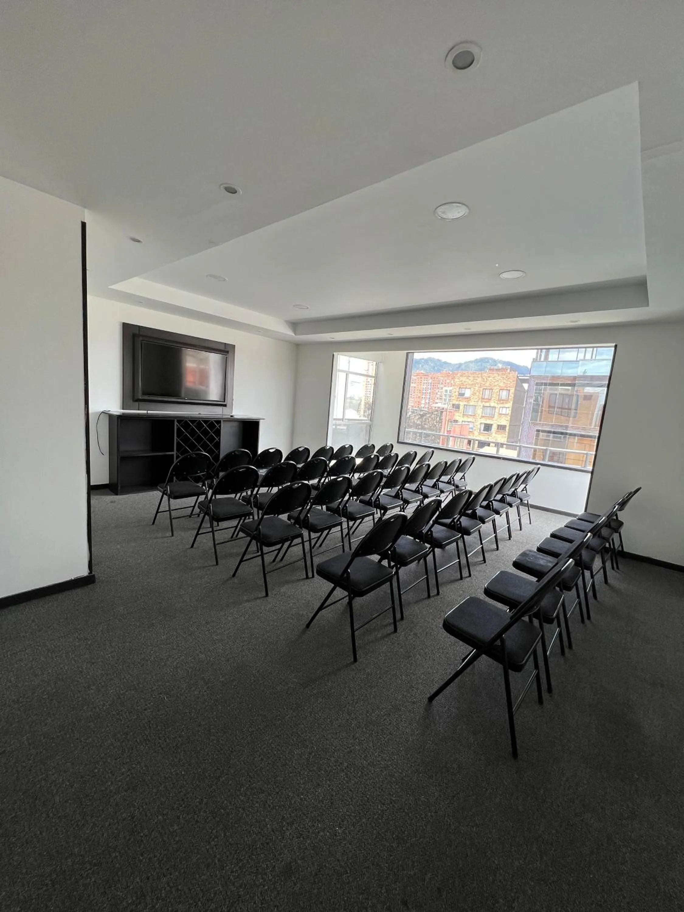 Communal lounge/ TV room in Hotel Expo Hotel Ferial