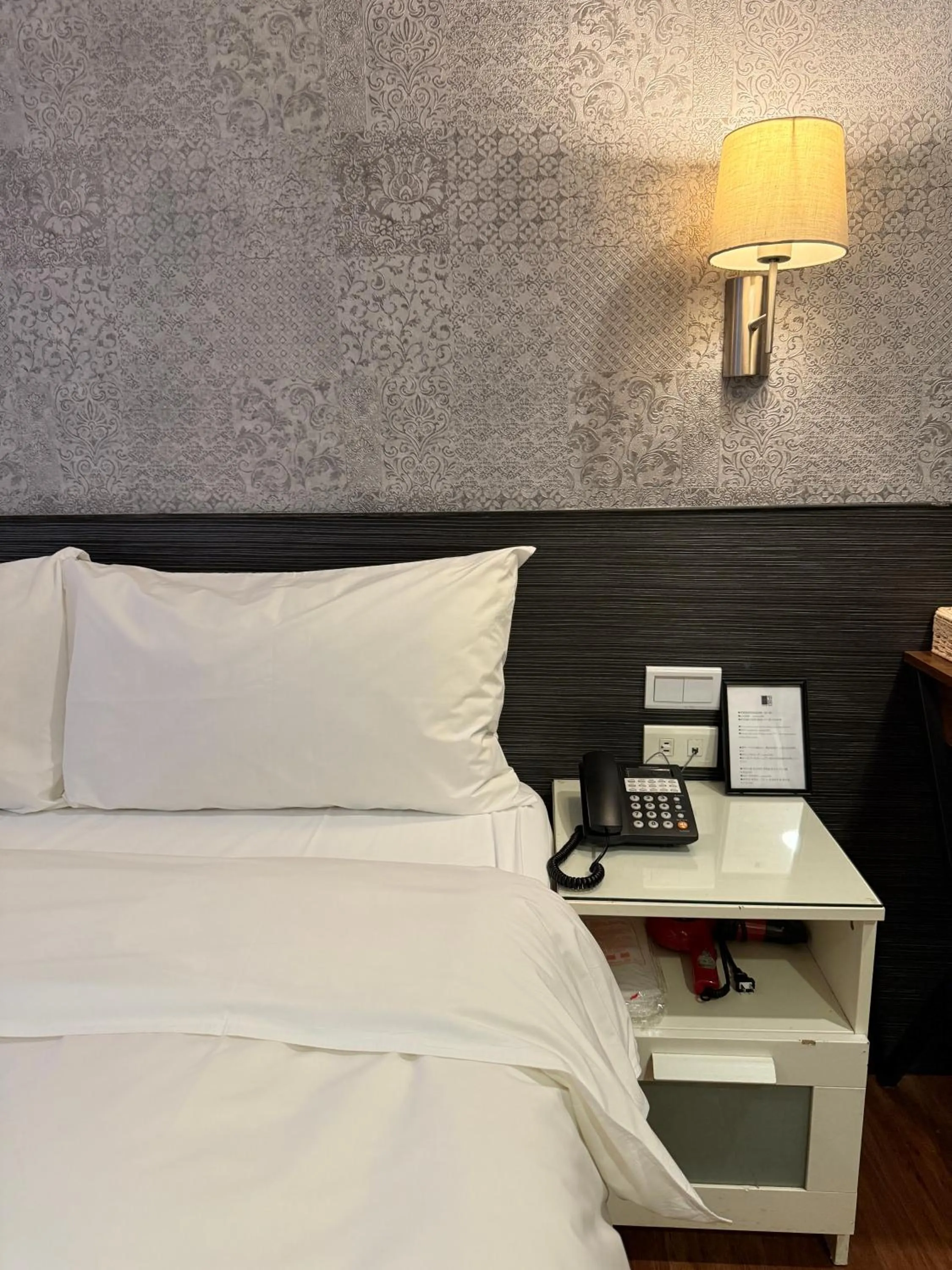 Bed in 泊居旅店 Oursinn Hotel