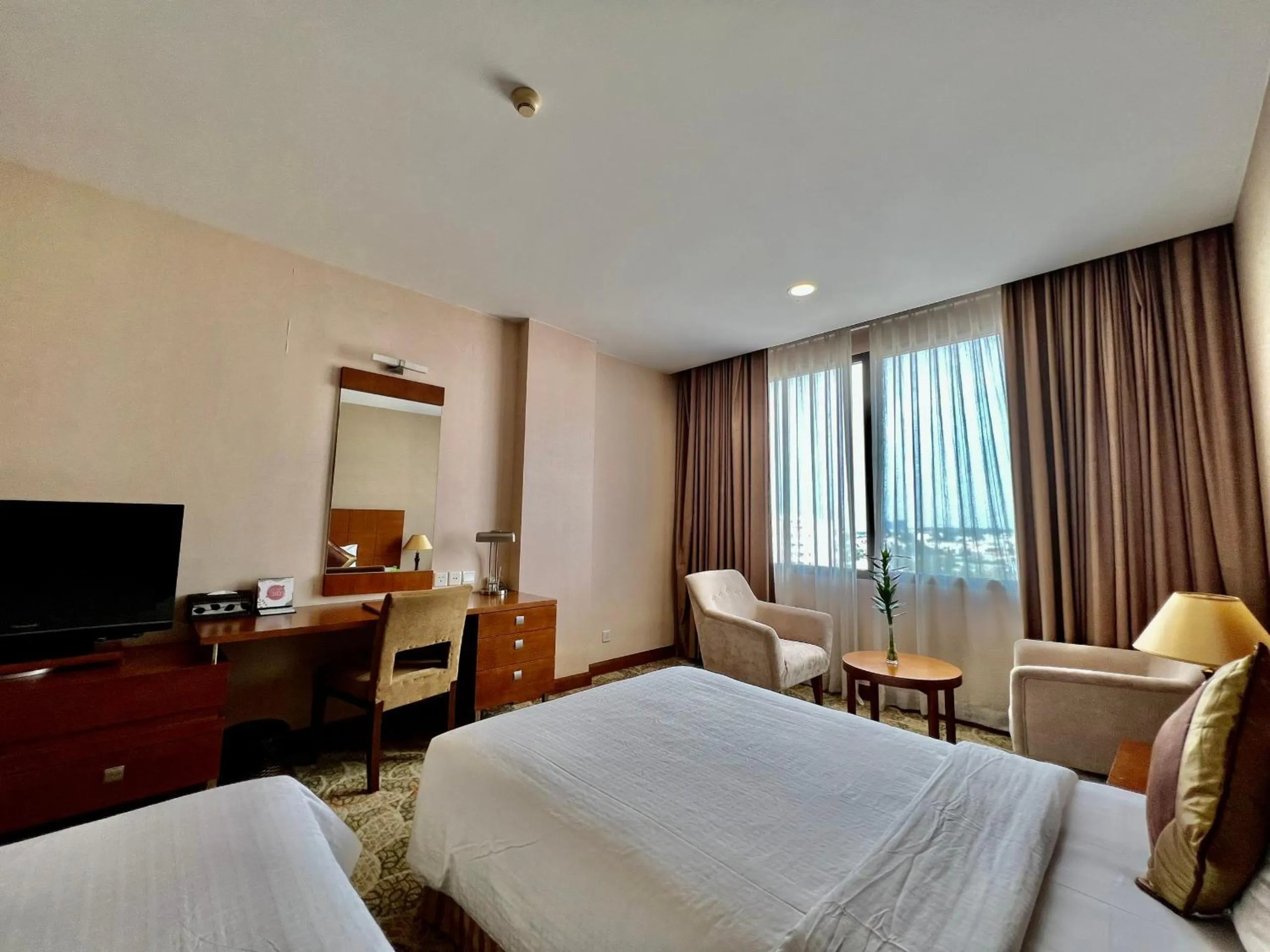 Bed in AURORA Hotel Plaza