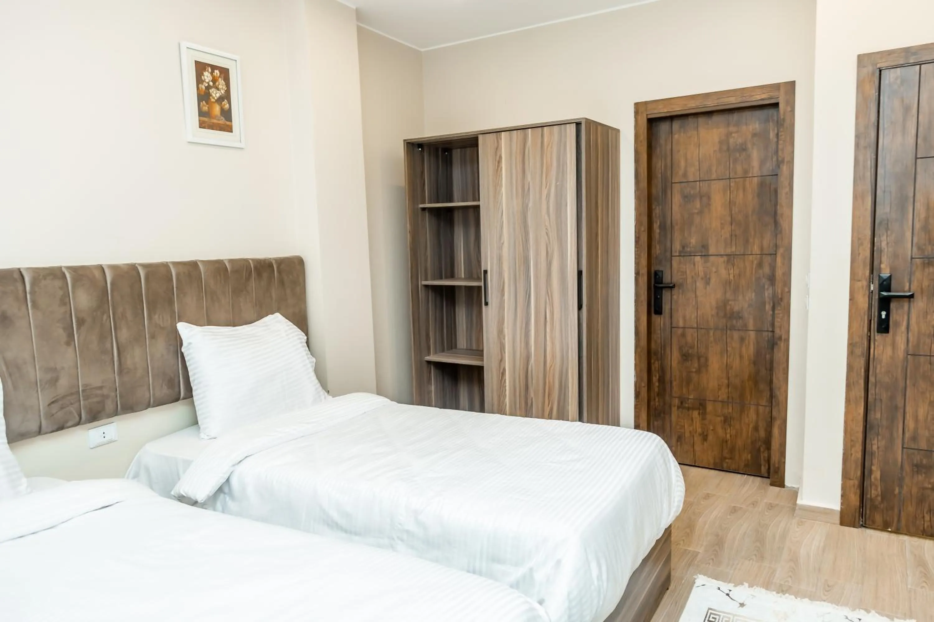 Bed in Night Pyramids Inn Hotel