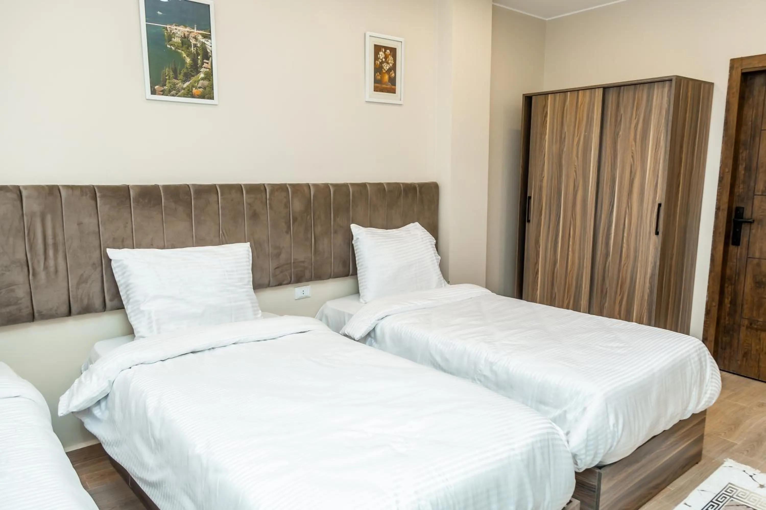 Bed in Night Pyramids Inn Hotel