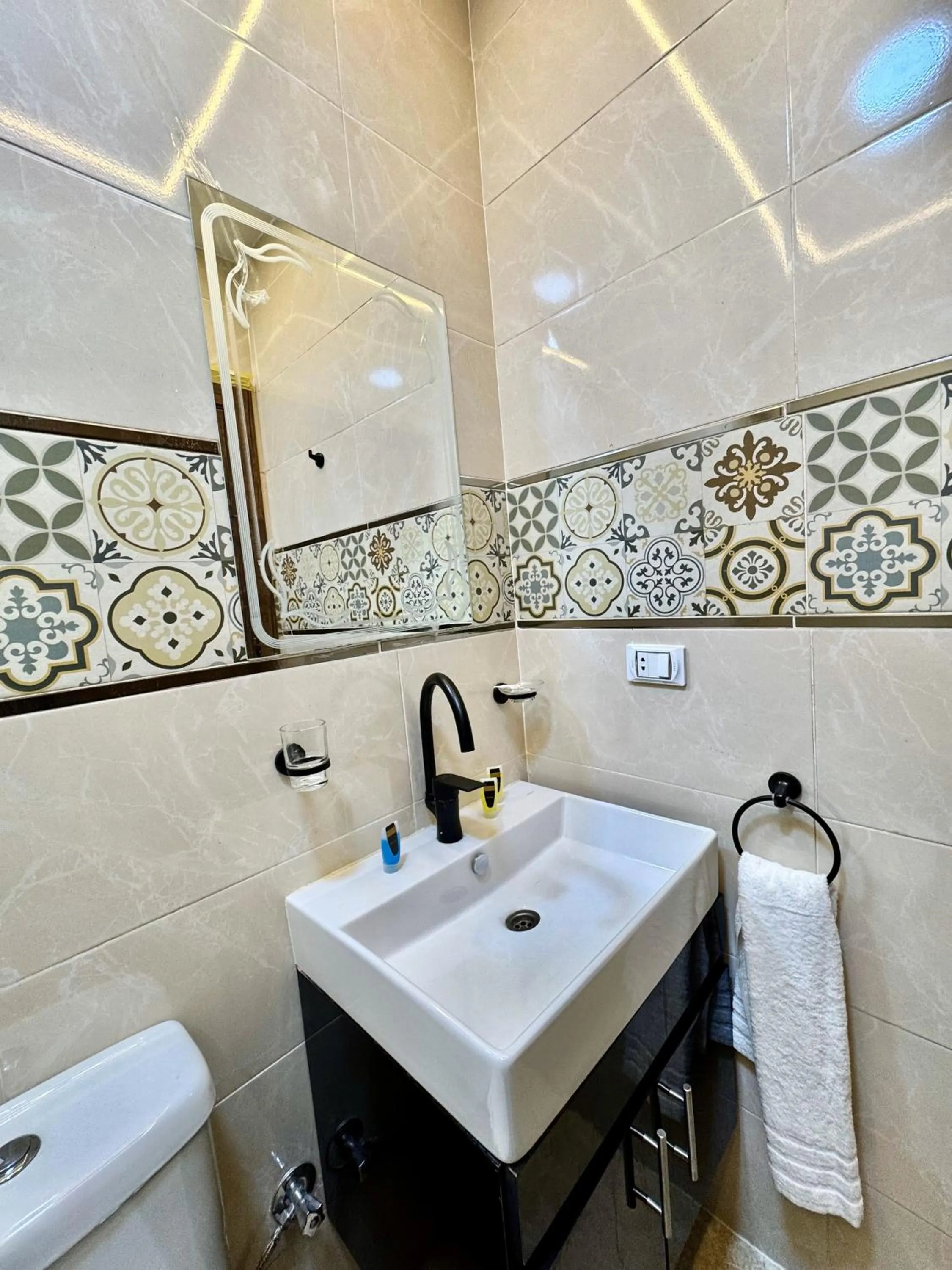 Shower in Night Pyramids Inn Hotel