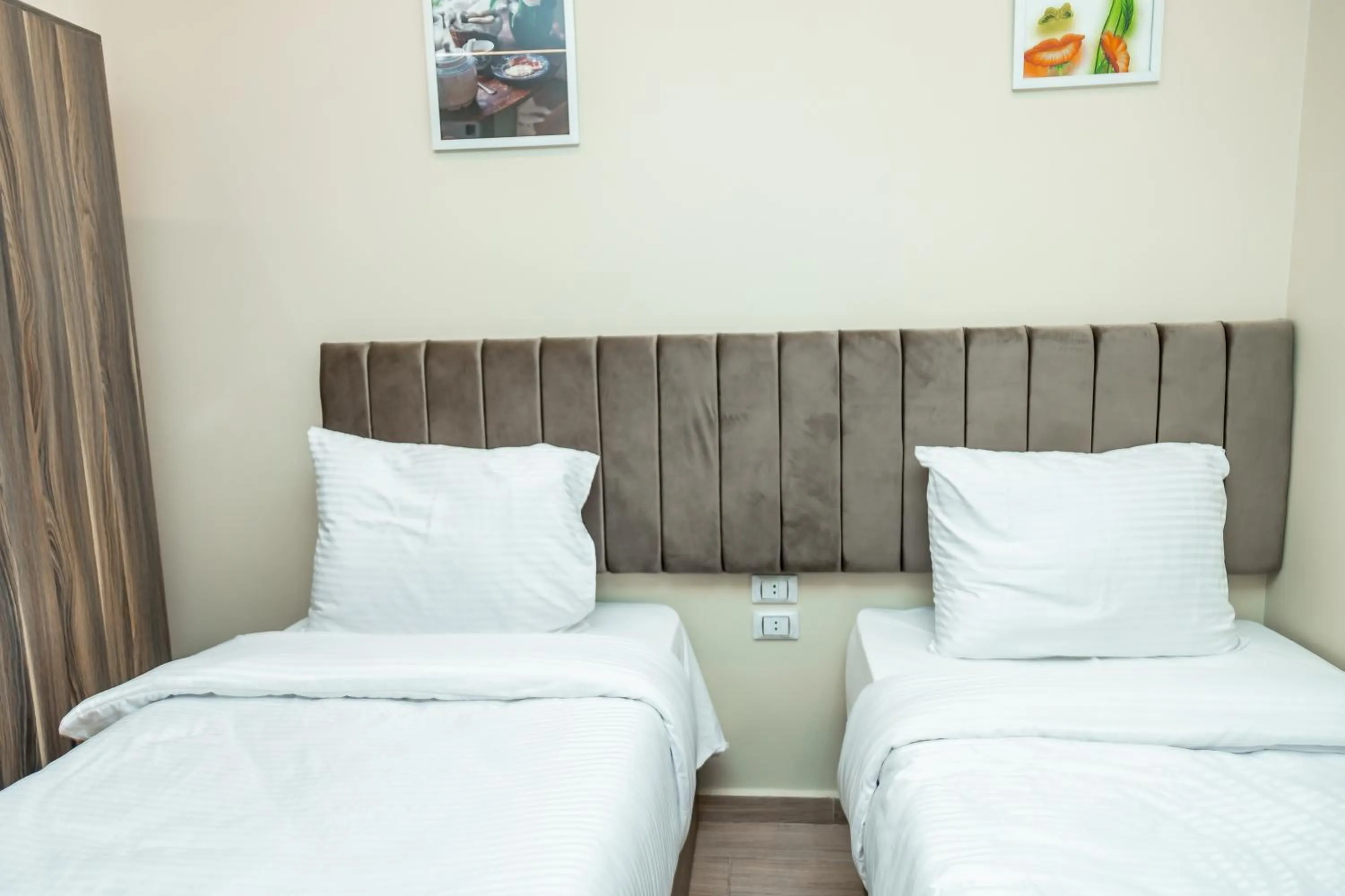 Bed in Night Pyramids Inn Hotel