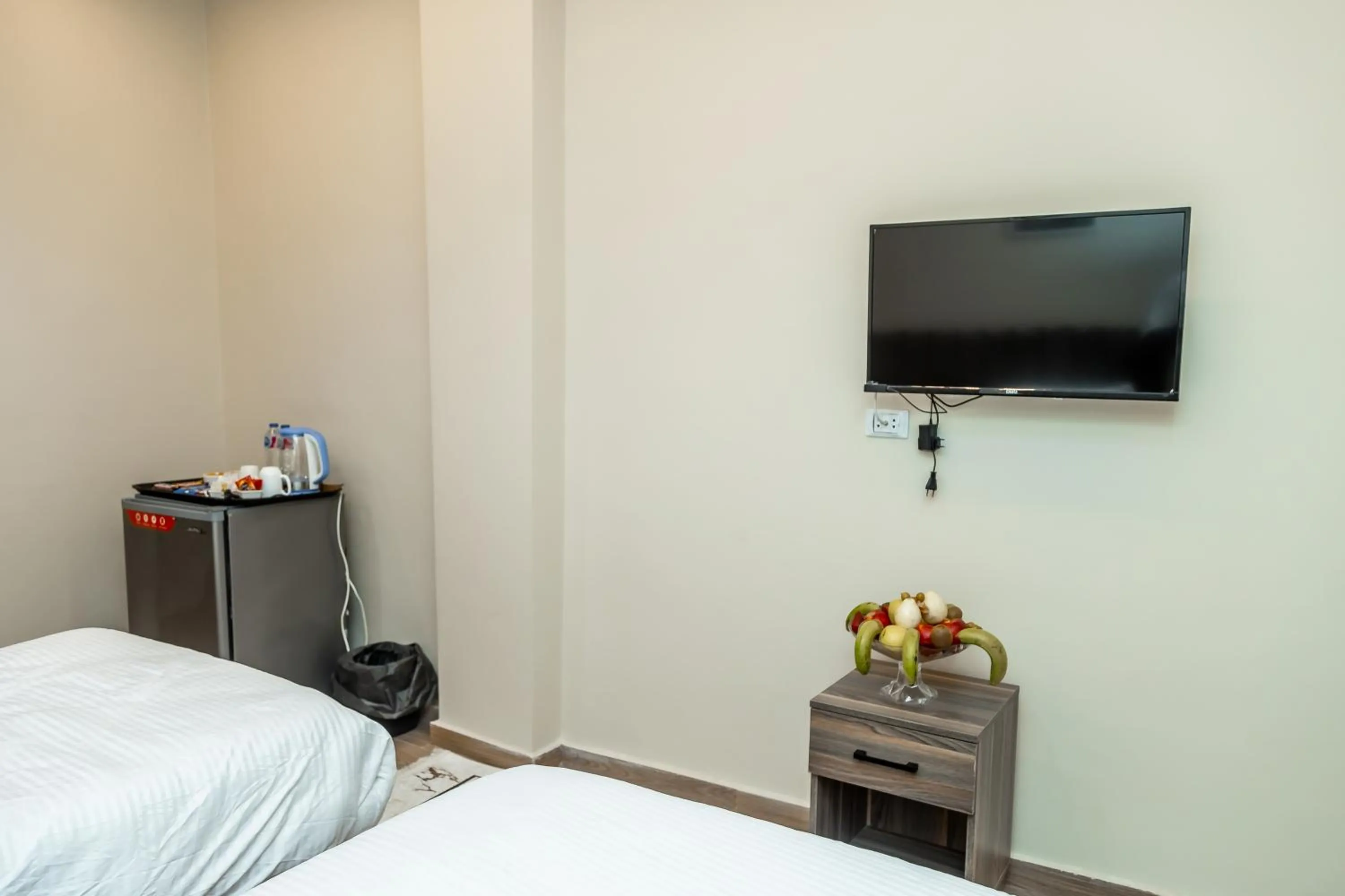 Bed in Night Pyramids Inn Hotel