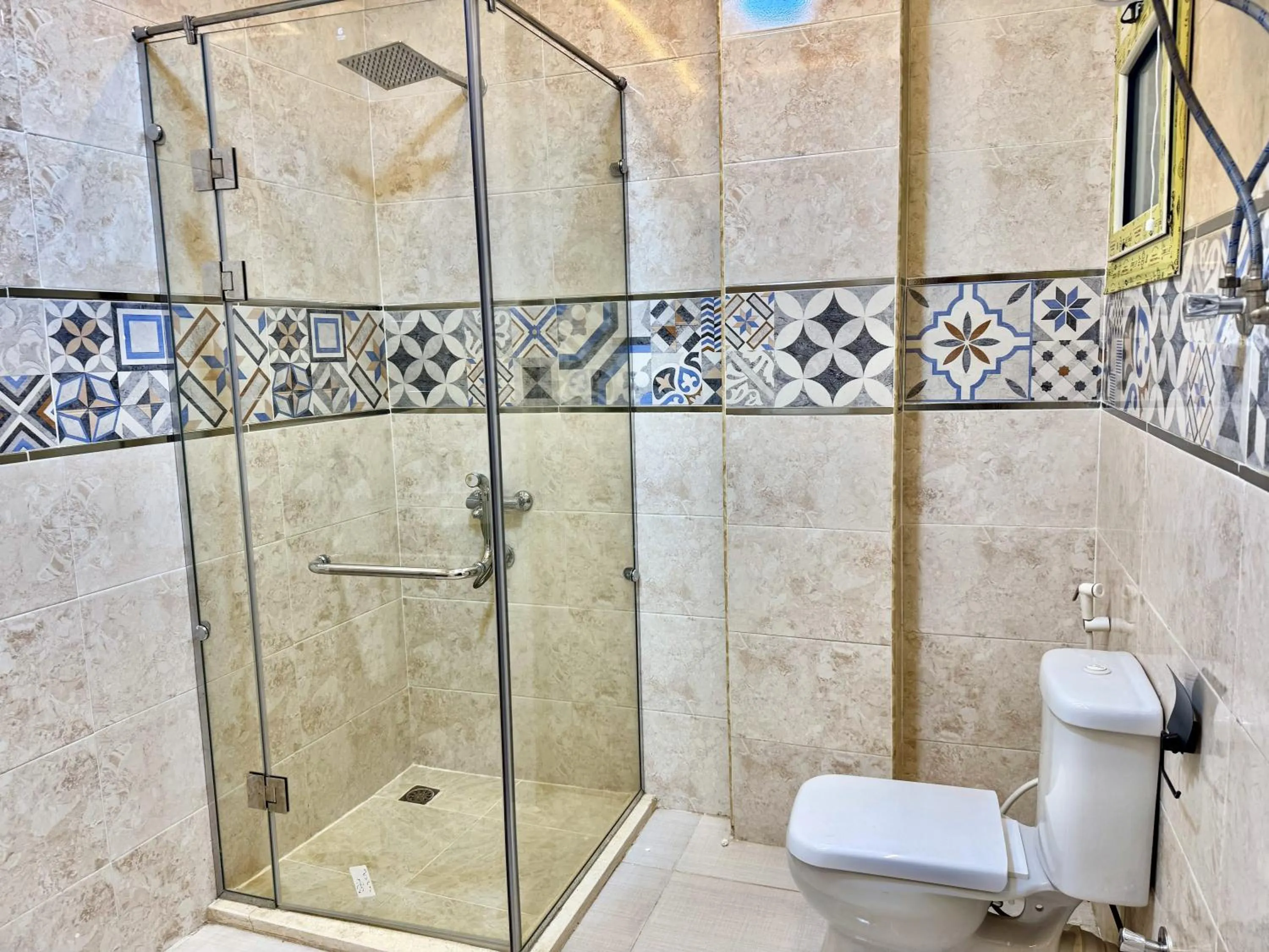 Shower in Night Pyramids Inn Hotel