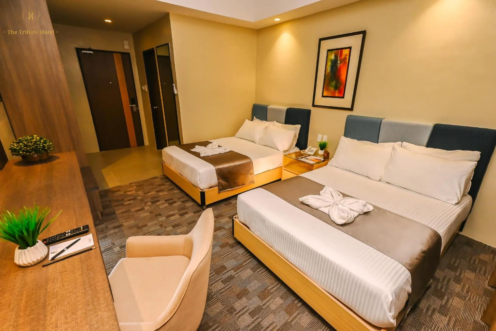 Bed in The Tribute Hotel