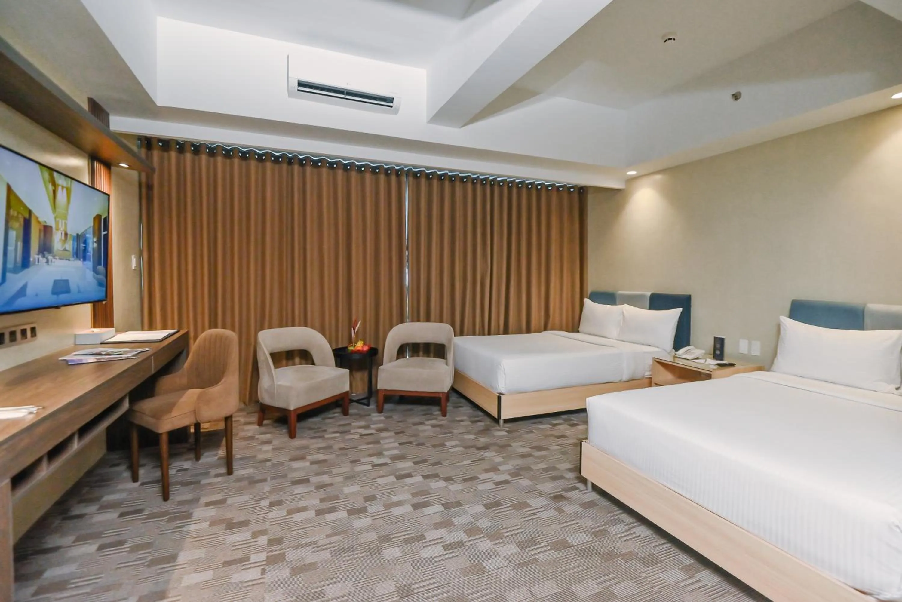 Bed in The Tribute Hotel