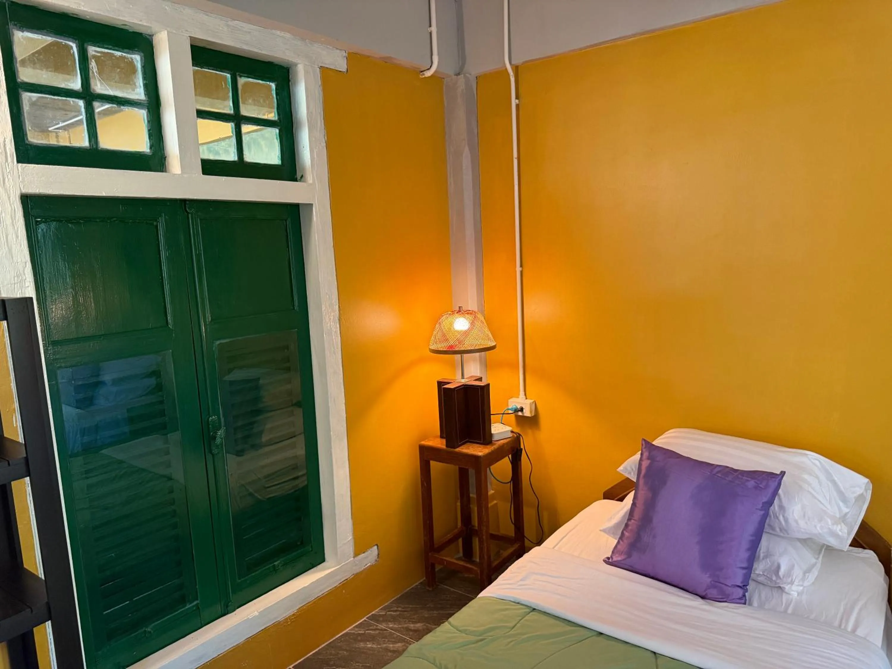 Bed in Golden Mango House