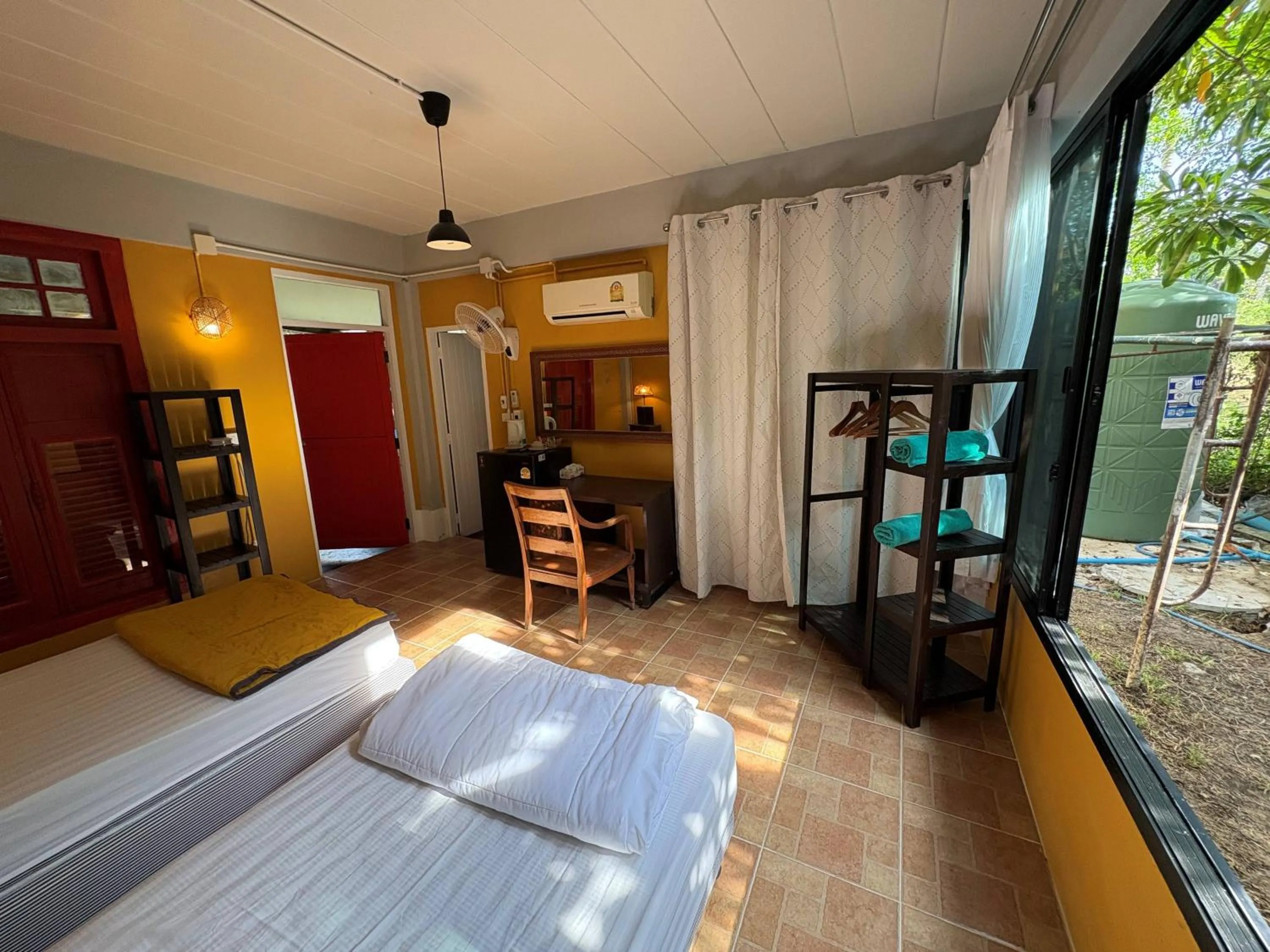 Bed in Golden Mango House