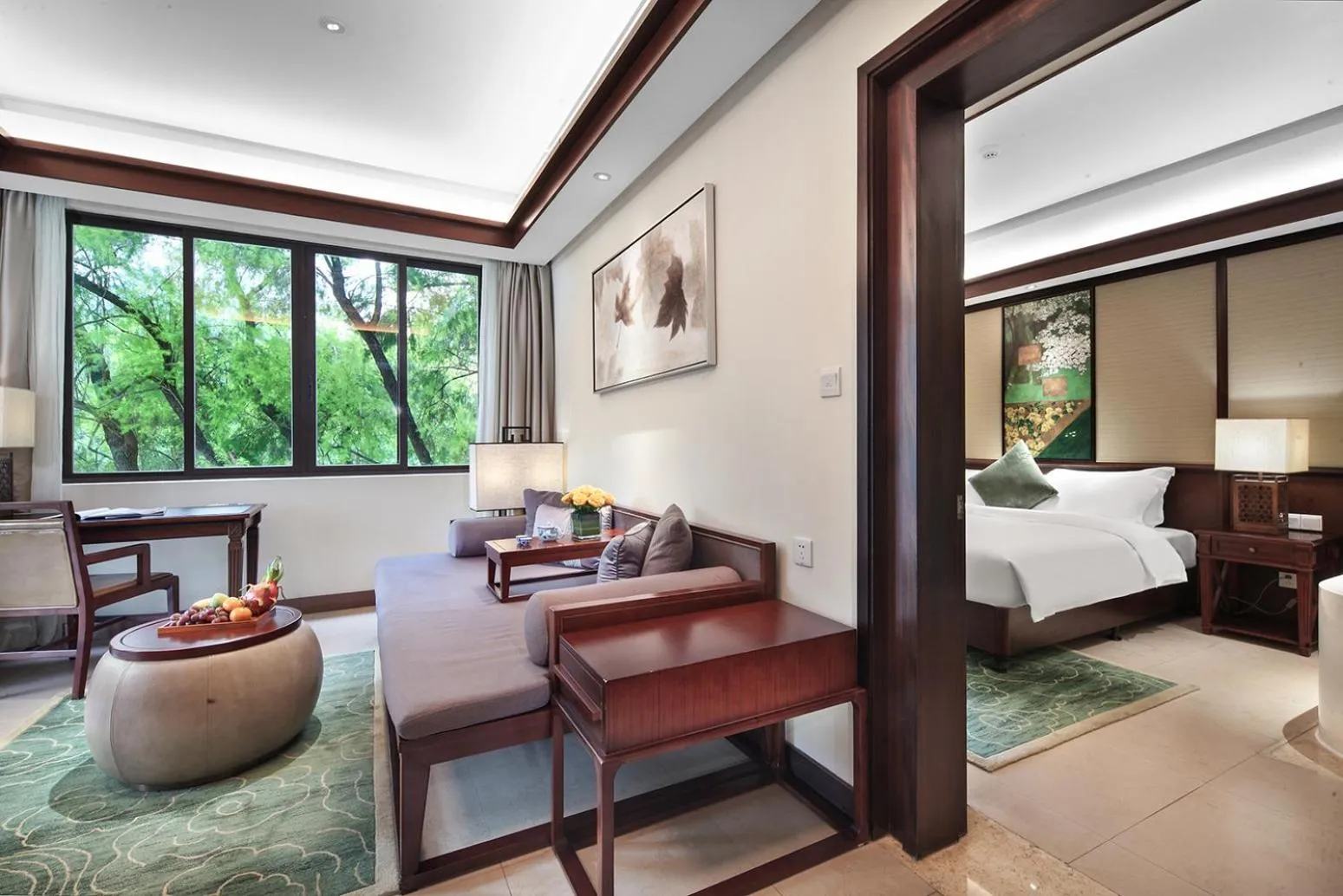 Seating area, Bed in Yangshuo Riverside Resorts Hotel
