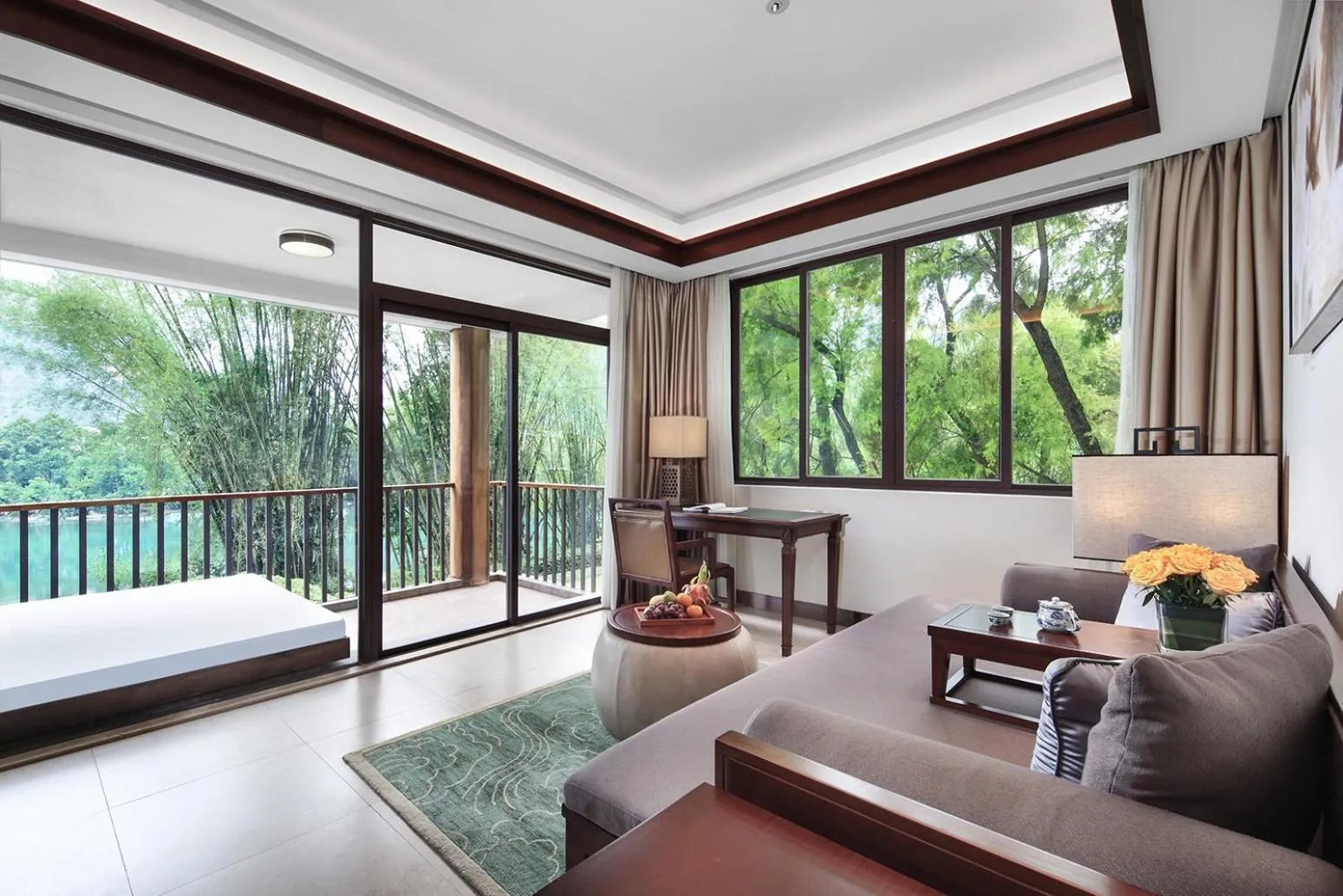 Seating area, Bed in Yangshuo Riverside Resorts Hotel