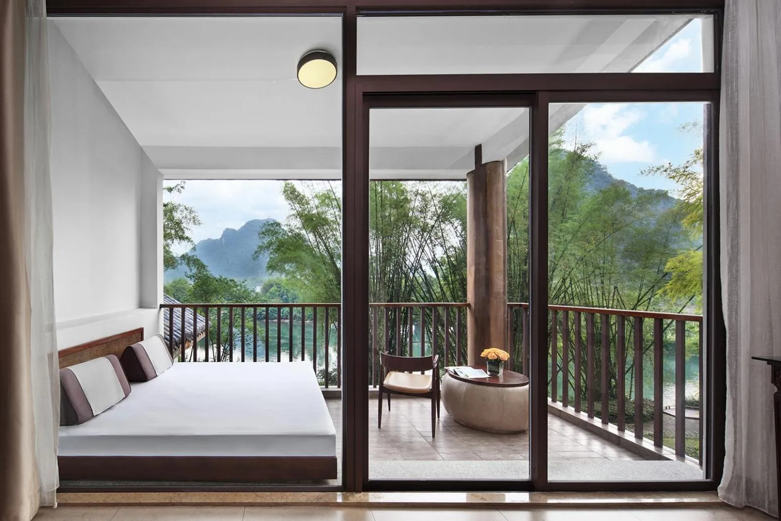 View (from property/room), Bed in Yangshuo Riverside Resorts Hotel