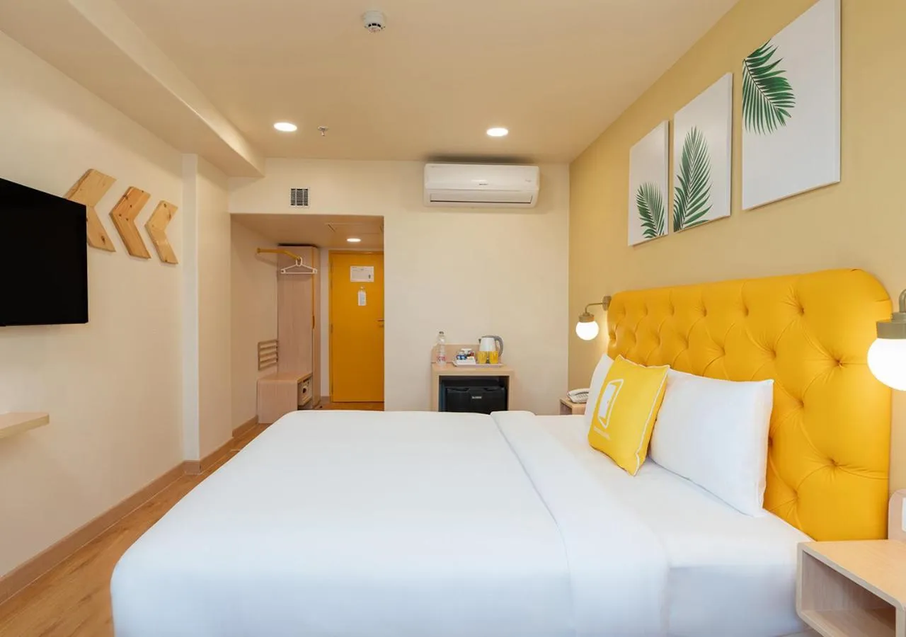 Bedroom, Bed in Bloom Hotel - SG Highway