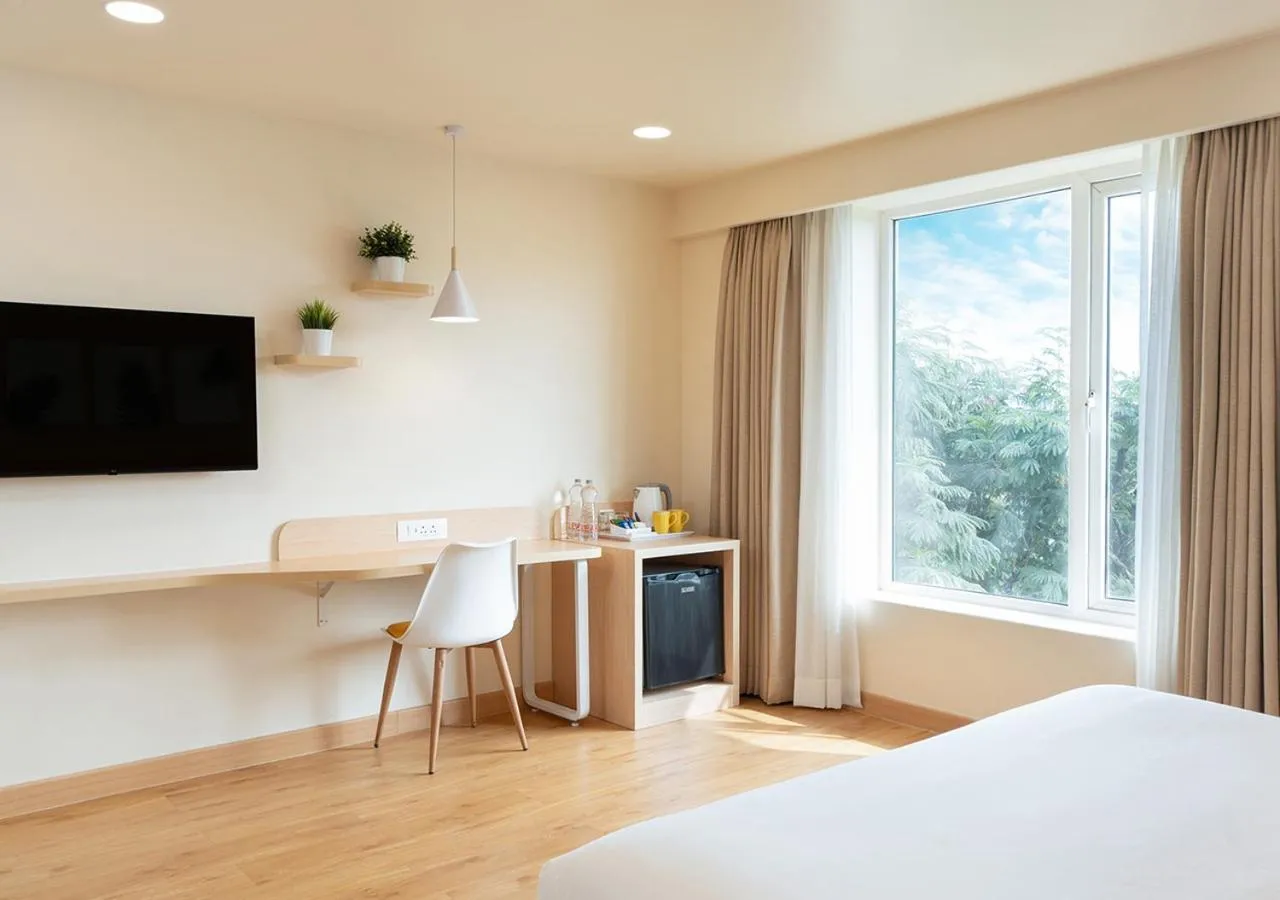 View (from property/room), Bed in Bloom Hotel - SG Highway