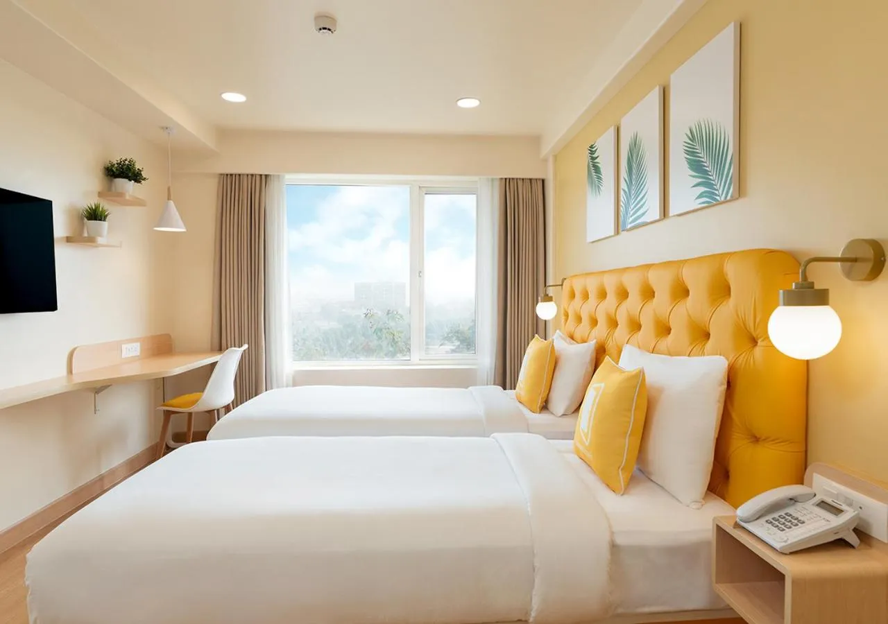 View (from property/room), Bed in Bloom Hotel - SG Highway