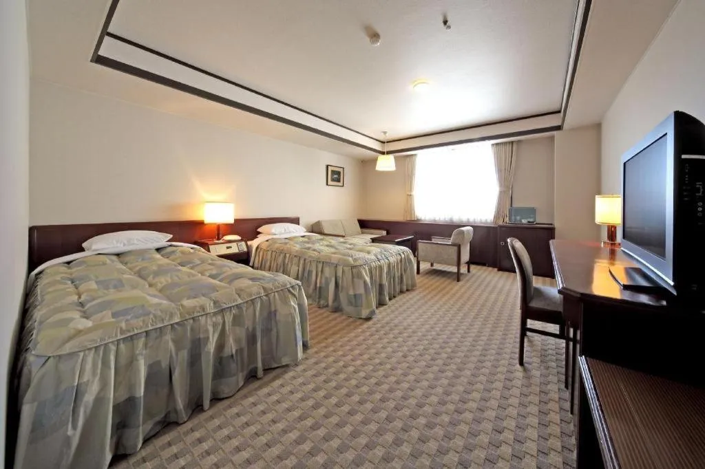 Bed in Gifu Grand Hotel