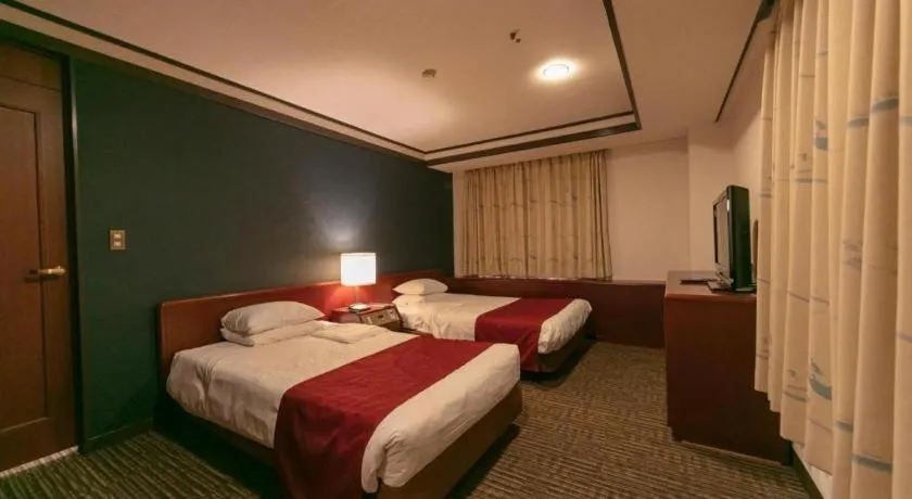 Bed in Gifu Grand Hotel