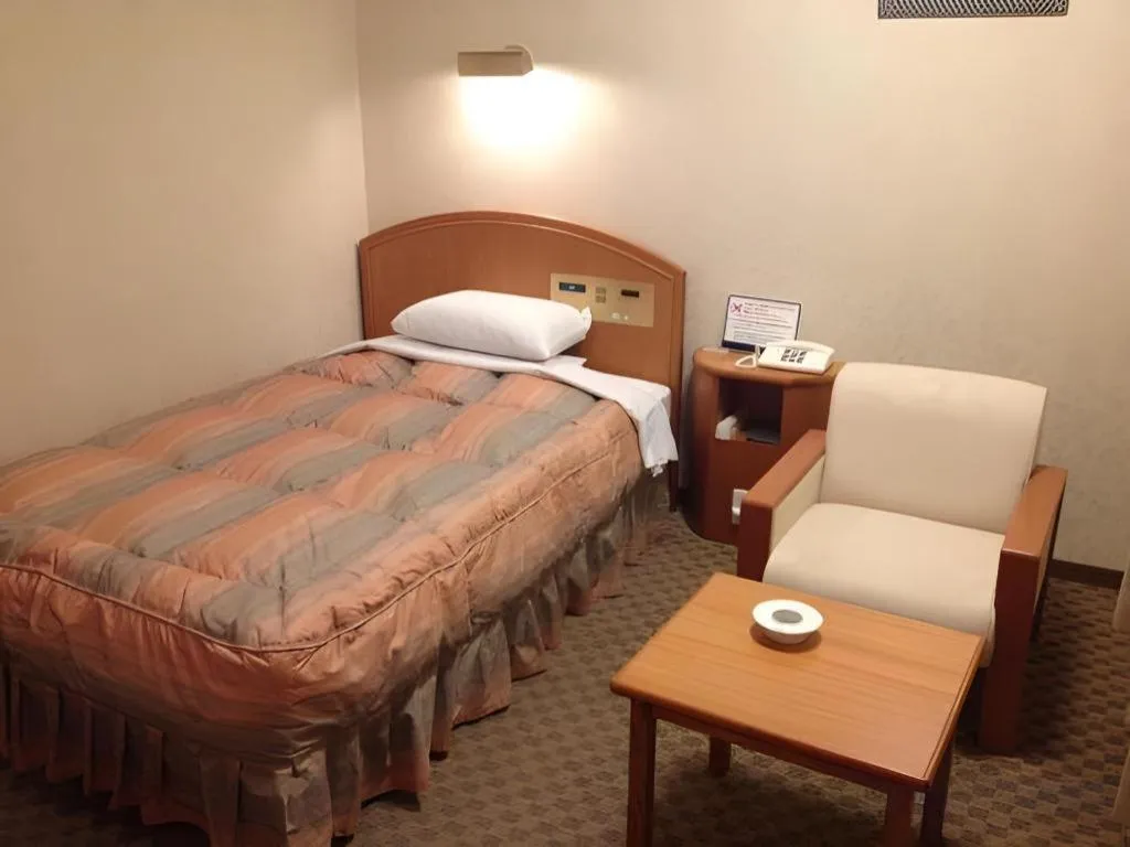 Bed in Gifu Grand Hotel