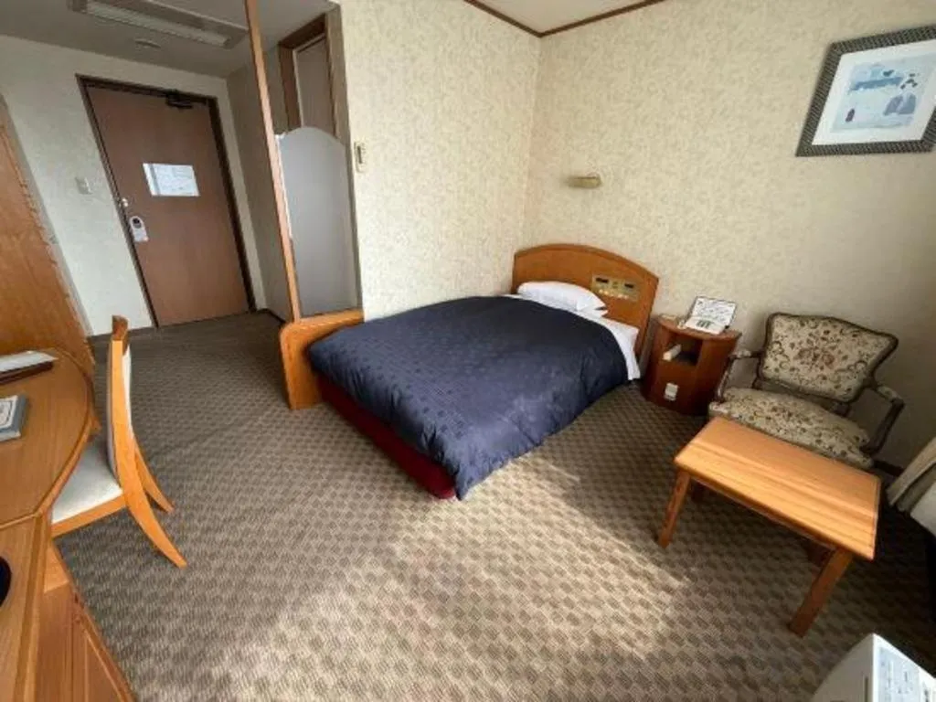 Bed in Gifu Grand Hotel