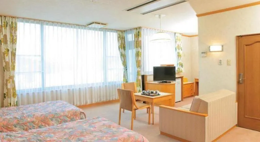 Bed in Ikenotaira Hotel