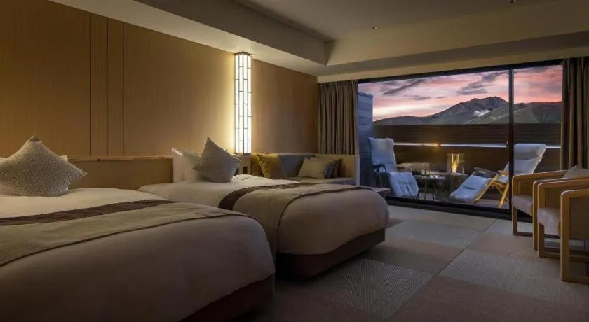 Bed in Ikenotaira Hotel