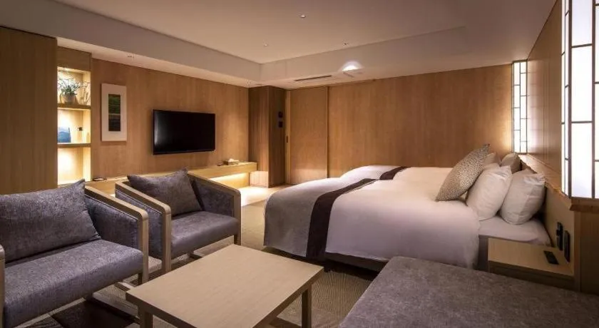 Bed in Ikenotaira Hotel