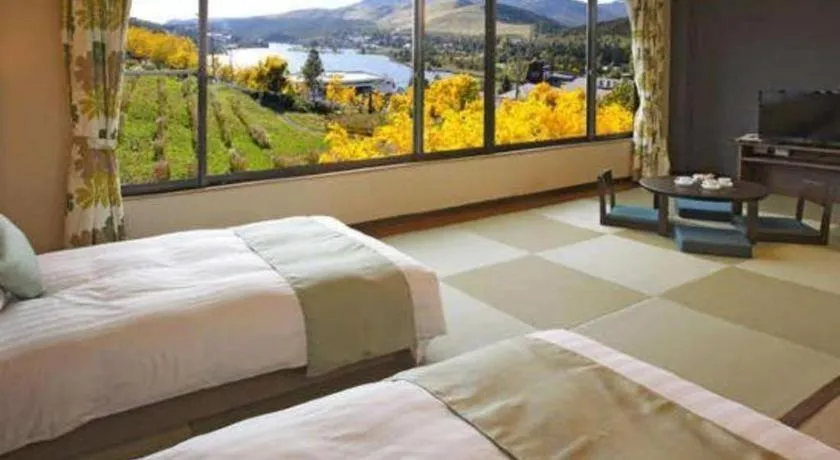 Bed in Ikenotaira Hotel