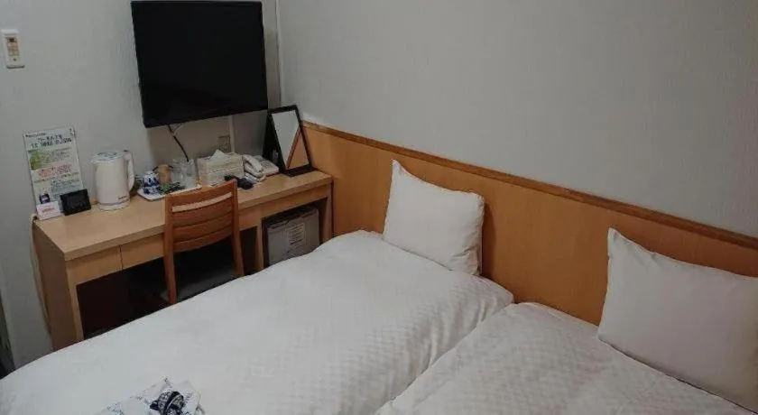 Bed in Pearl Hotel Ota