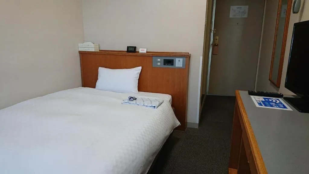 Bed in Pearl Hotel Ota