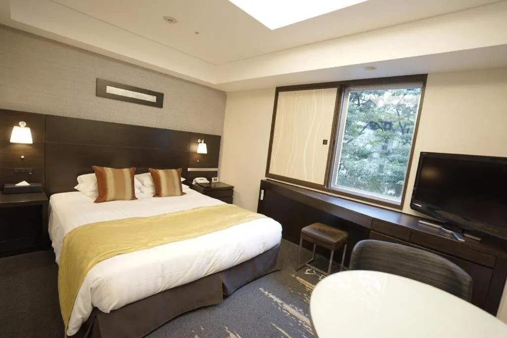 Bed in Akasaka Excel Hotel Tokyu