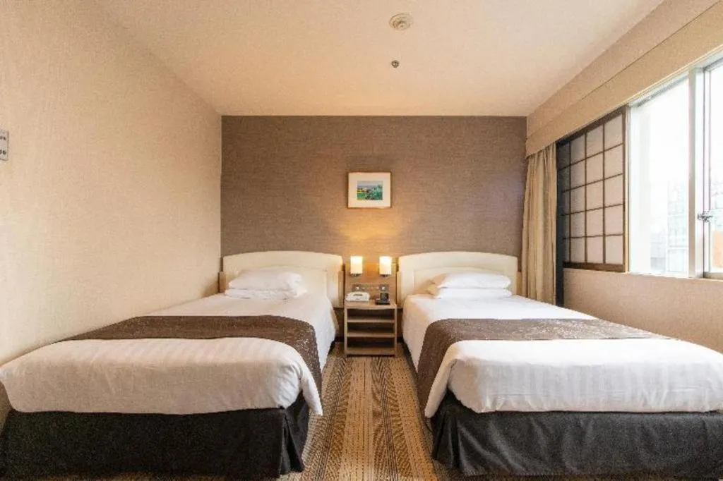 Bed in Akasaka Excel Hotel Tokyu