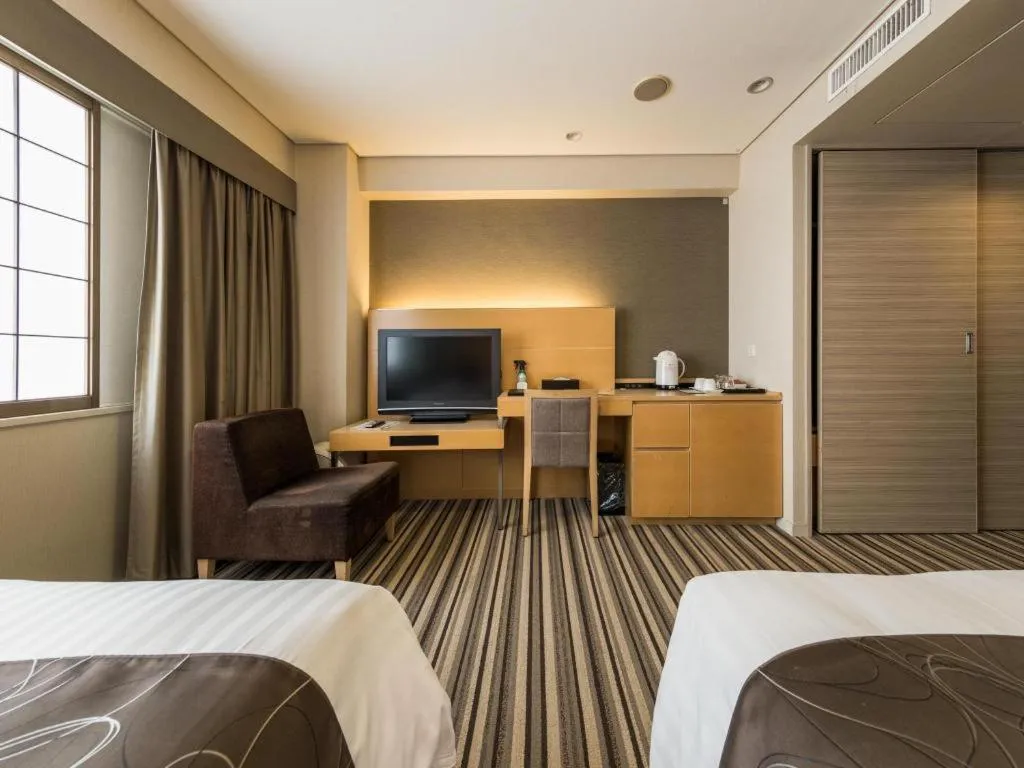 Bed in Akasaka Excel Hotel Tokyu