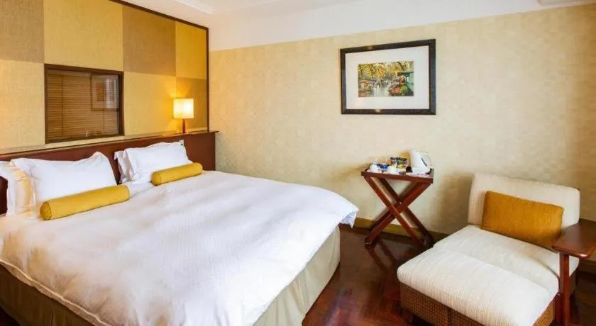 Bed in Miyazaki Kanko Hotel