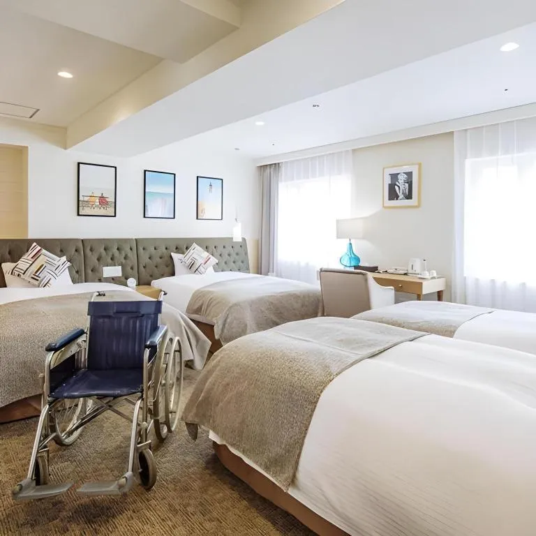 Bed in Miyazaki Kanko Hotel