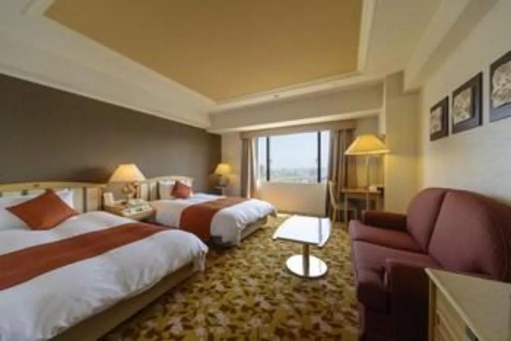 Bed in Miyazaki Kanko Hotel