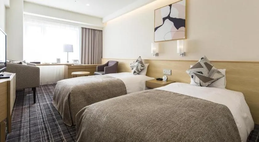 Bed in Miyazaki Kanko Hotel