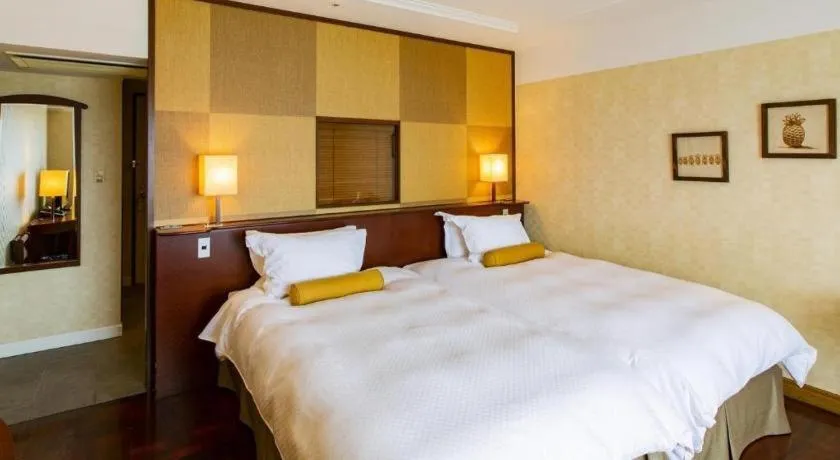 Bed in Miyazaki Kanko Hotel