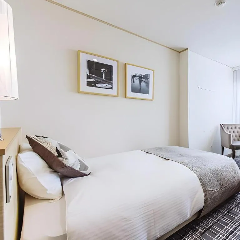 Bed in Miyazaki Kanko Hotel