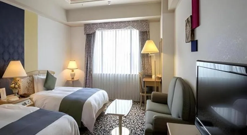 Bed in Miyazaki Kanko Hotel