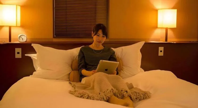 Bed in Miyazaki Kanko Hotel