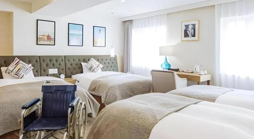 Bed in Miyazaki Kanko Hotel